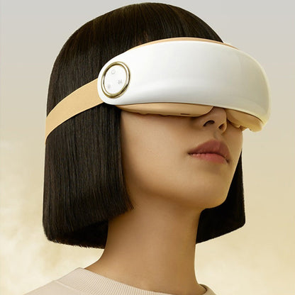 Fuktgivande och lugnande ögonmassageapparat