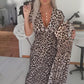 Damklänning med V-ringning och leopardmönster