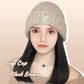 Kvinnors stickade mössa med hårförlängning