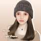 Kvinnors stickade mössa med hårförlängning